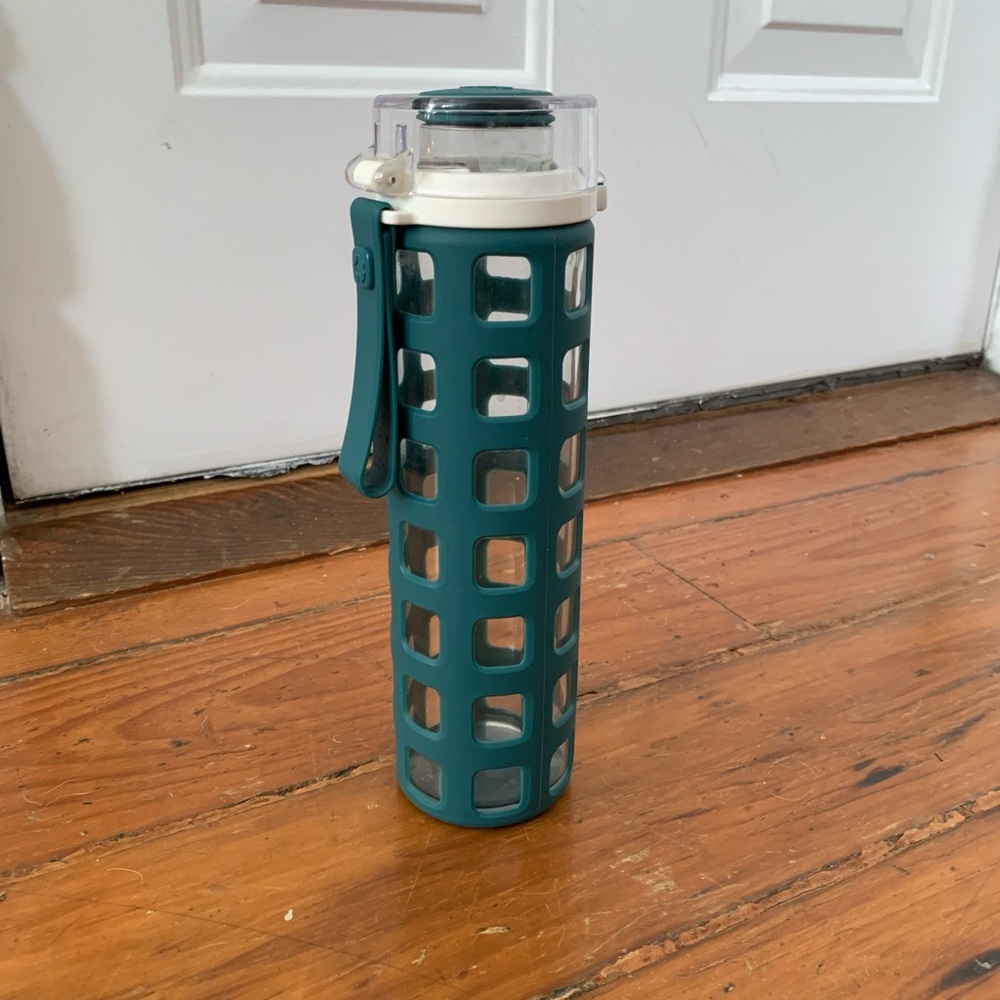 20 oz glass Water Bottle with teal Sleeve